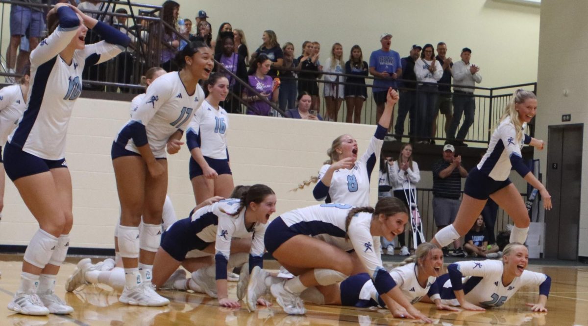 Ichabods celebrate a successful kill. The team cheered on their fellow Ichabods with yelling, dancing and diving with each successful play.
