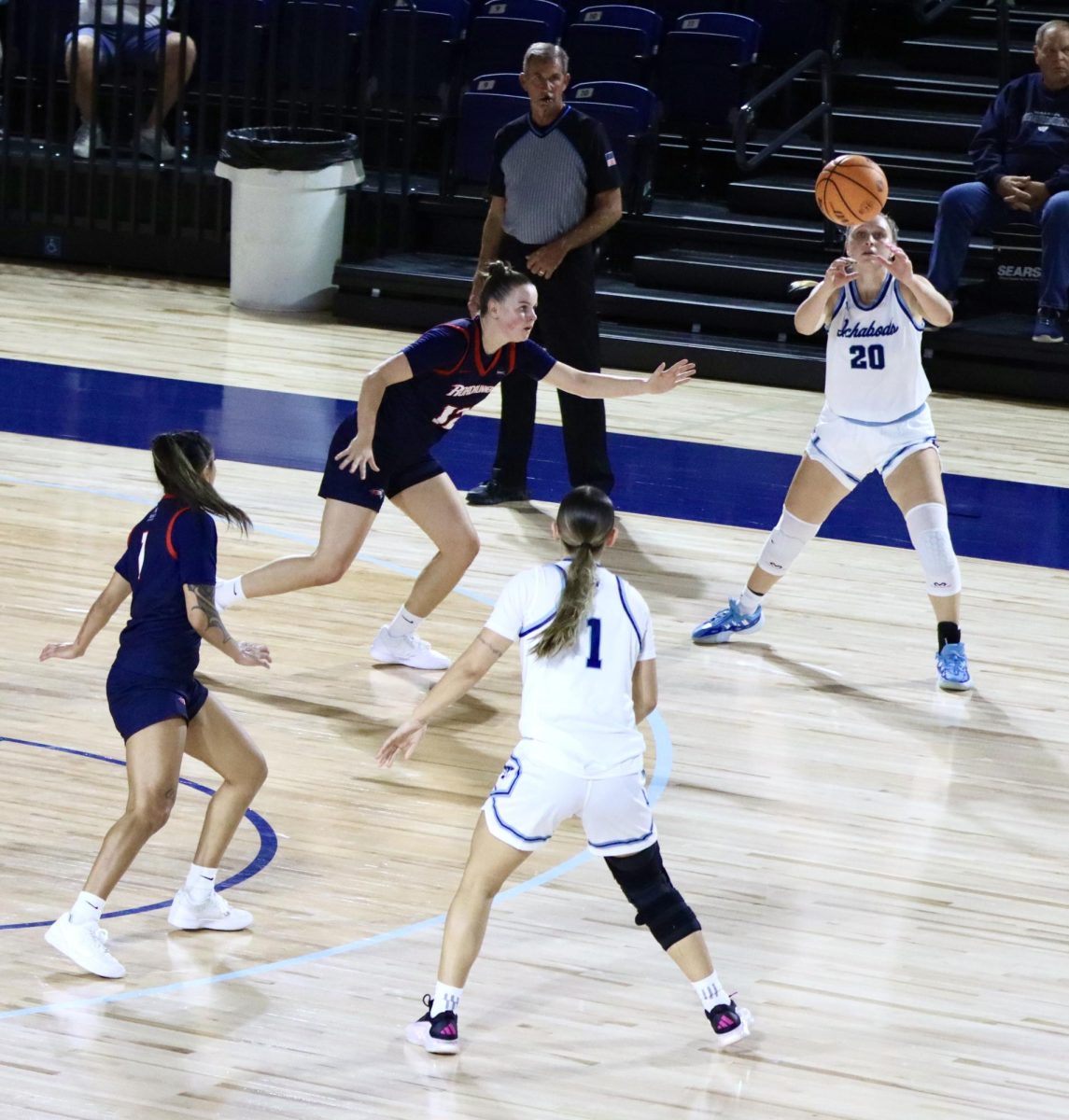 Senior guard Gabi Giovannetti sets up the offense near midcourt. She handled primary ball-handling duties throughout the game.
