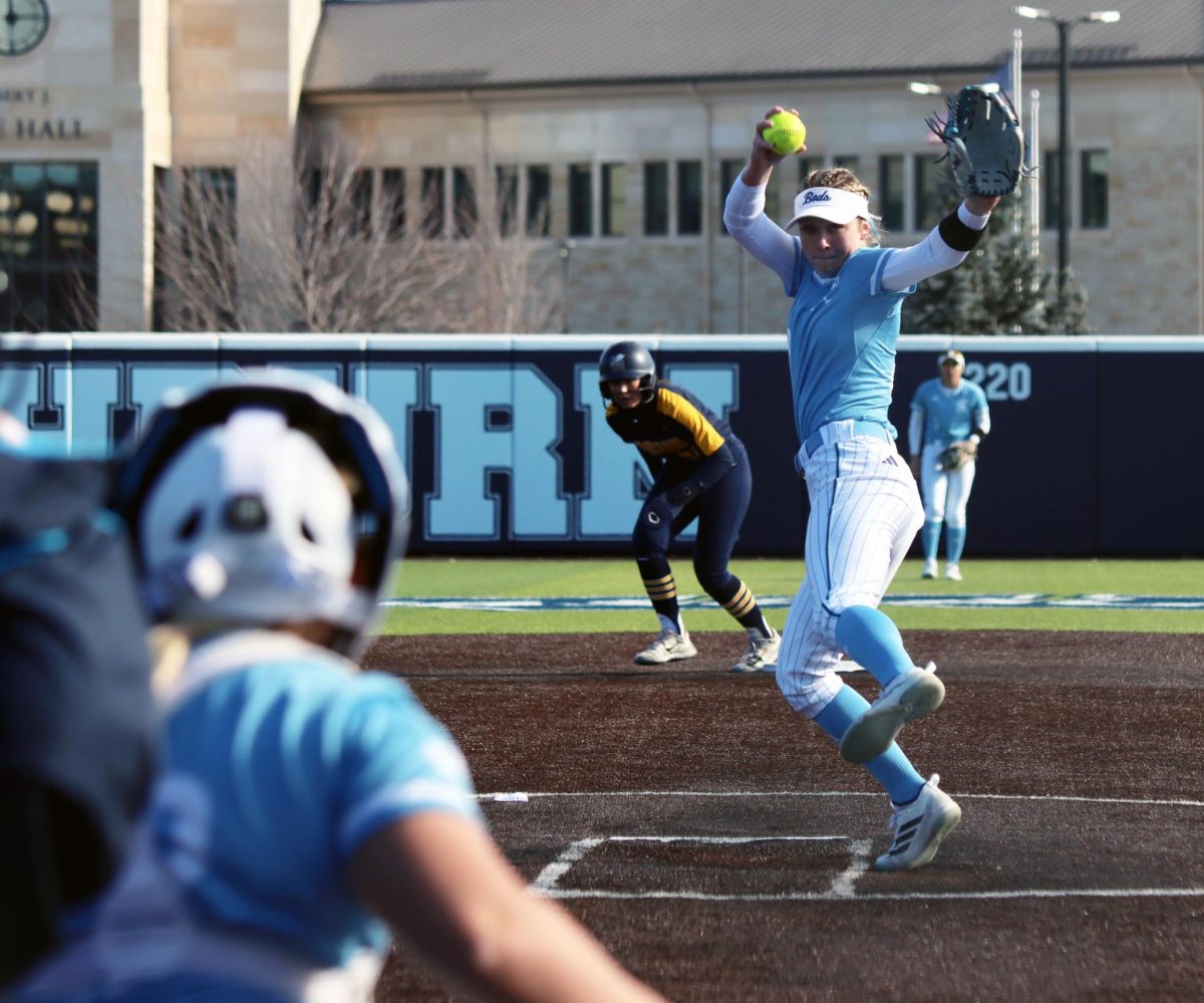 Junior pitcher Kierra Goos aims to strike out a Montana State University Billings batter. Goos struck out four while allowing five walks.

