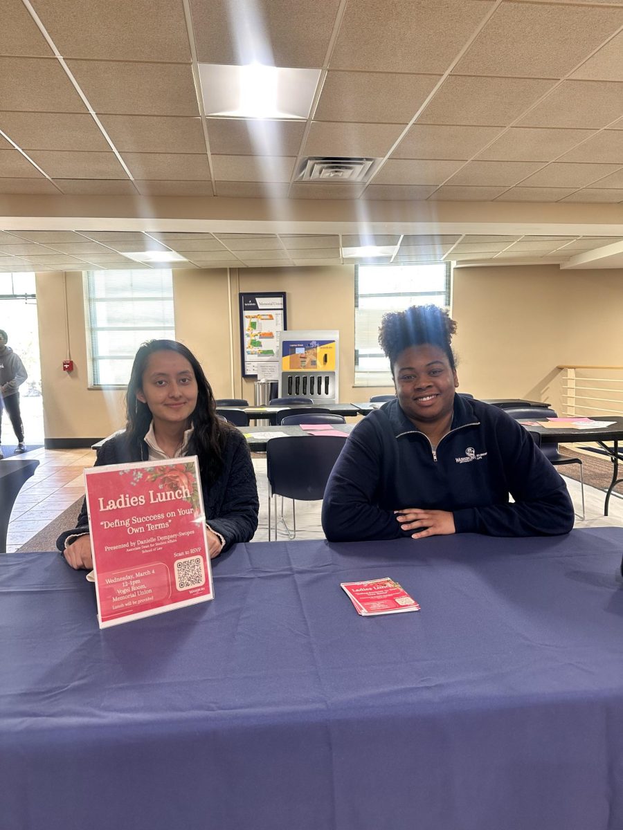 Salina Giri (left), junior in computer information sciences major and Olivia Brice, assistant director of student involvement and development, represent the Intersection at table for “Love Others Loudly.” The Valentine’s-themed event encouraged students to write cards, share appreciation and pick up sweet treats.
