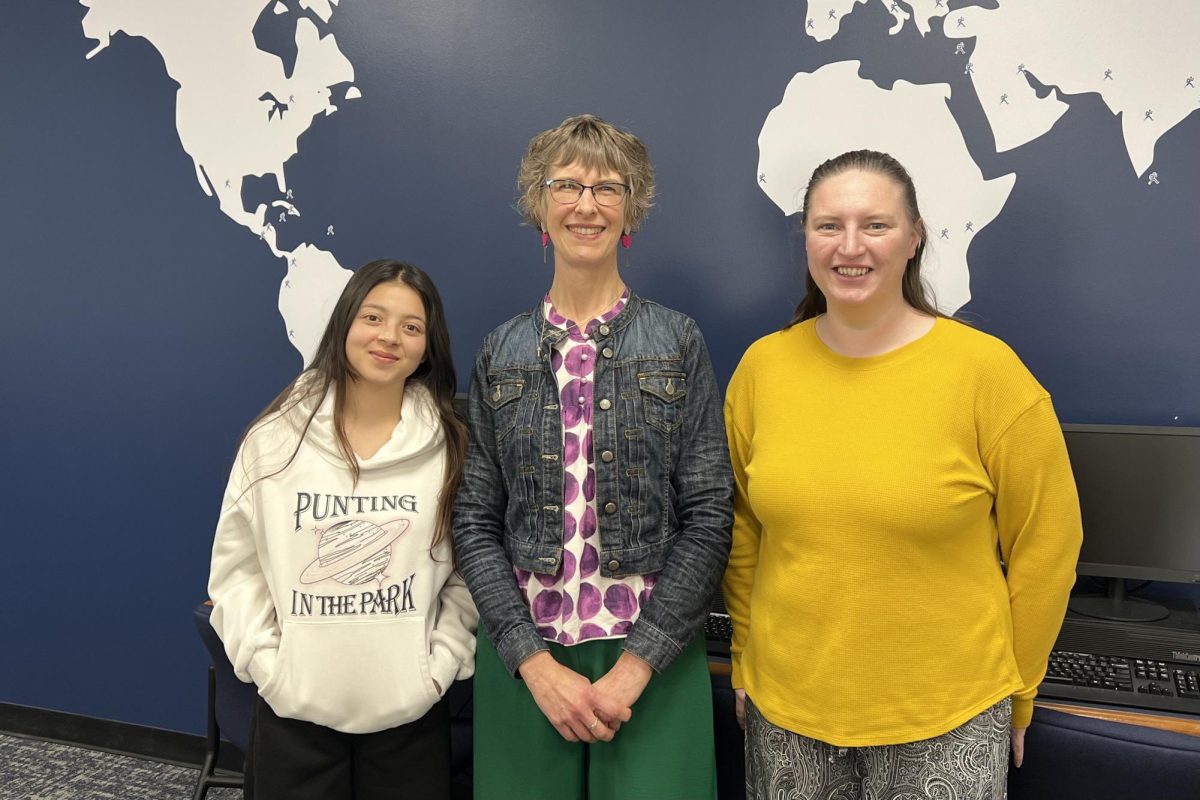 Apeksha Thapa (left), sophomore nursing major, Heidi Staerkel (middle), associate director of International Programs for Student Services, Michala Stokes (right), international student advisor, work together to support international students with different services. They have supported students to navigate college life. 
