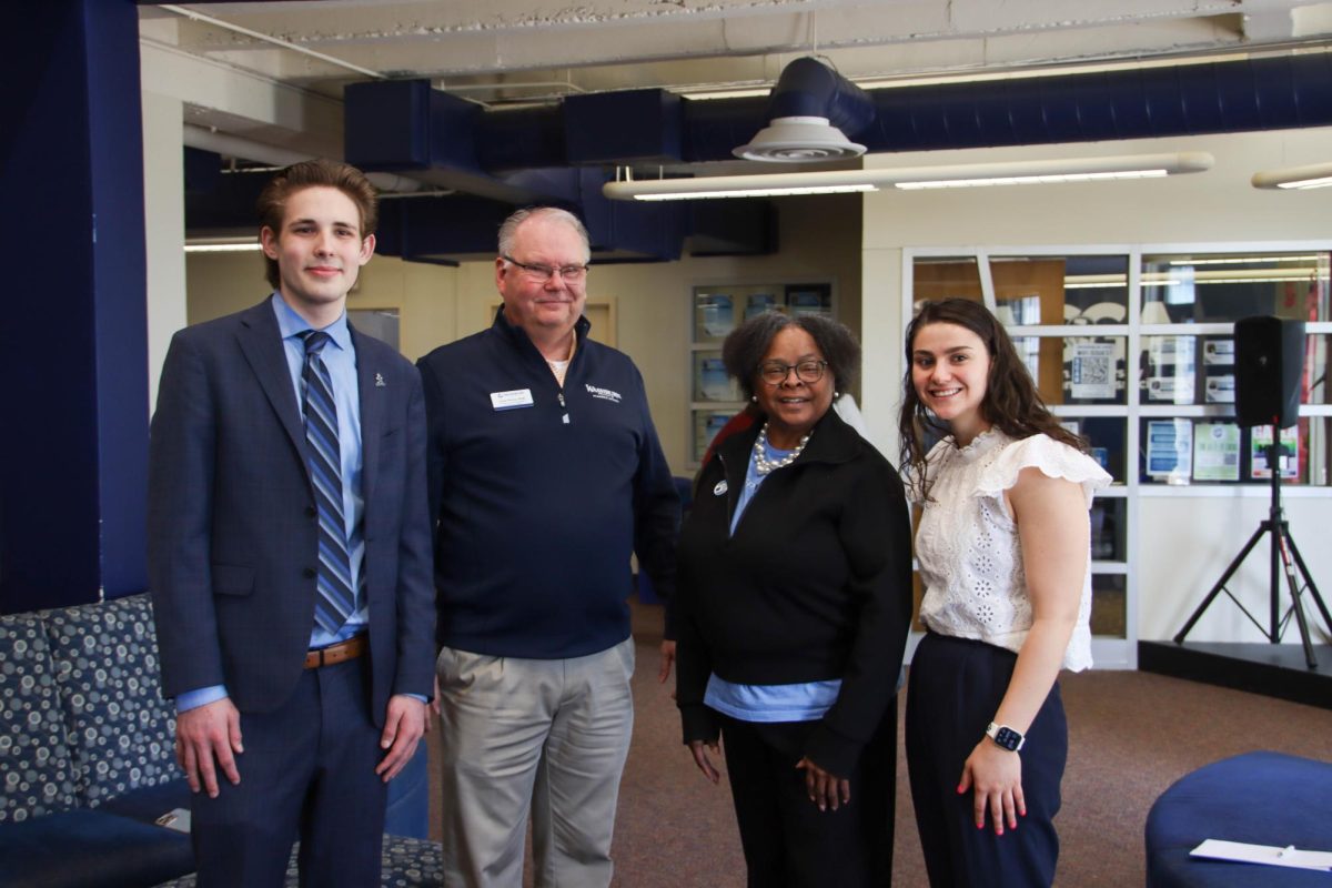 (From left to right) Caleb Newfer, newly elected WSGA president, John Fritch, university provost, Teresa Clounch, acting Vvce president for Student Life  and Kate Coulter, current WSGA President pose for the camera. Clounch acts as the faculty advisor for WSGA and was present to celebrate the election.