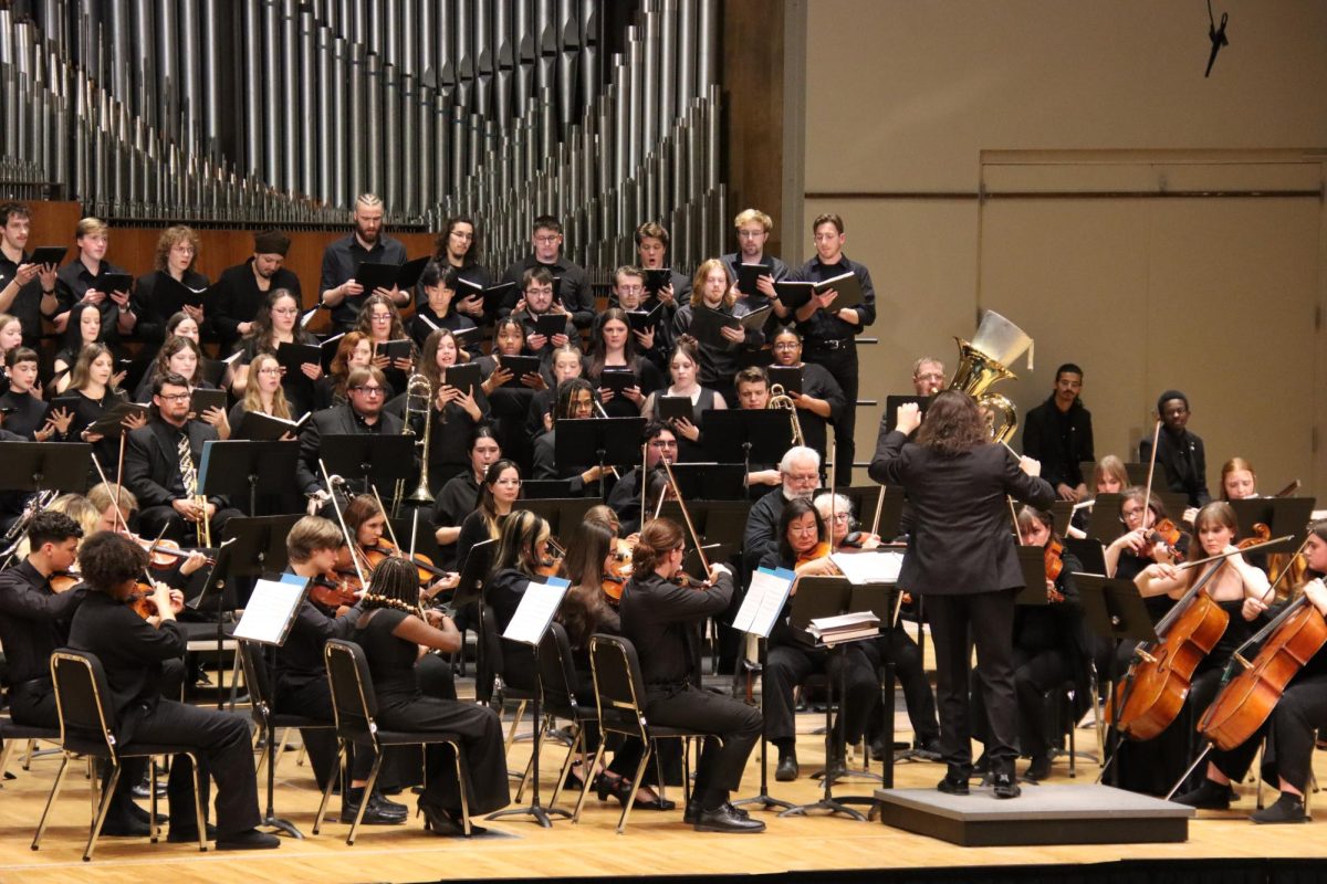 Cipriano conducts choral. Cipriano encouraged the audience to reflect on the meaningfulness of the chorus.
