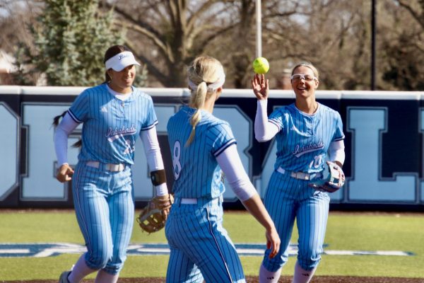 Sophomore infielder Dalaney Anderson (right) passes the ball to sophomore infielder Maddie McGee (middle). Washburn fell hard with an 11-3 loss in the second game on March 28 against Pittsburg State. 
