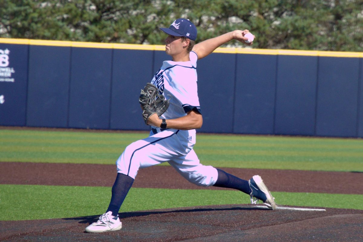 Freshman right-handed pitcher Sean Kingston delivers a pitch to the plate. Kingston pitched for 2 innings, allowing 3 hits and 1 strikeout. 