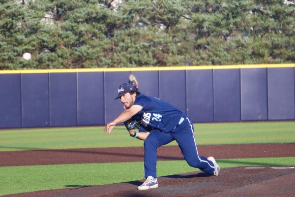 Senior left-handed pitcher Griffin Huiatt throws the pitch. Huiatt pitched 2.2 innings, allowing 2 hits and 1 earned run.