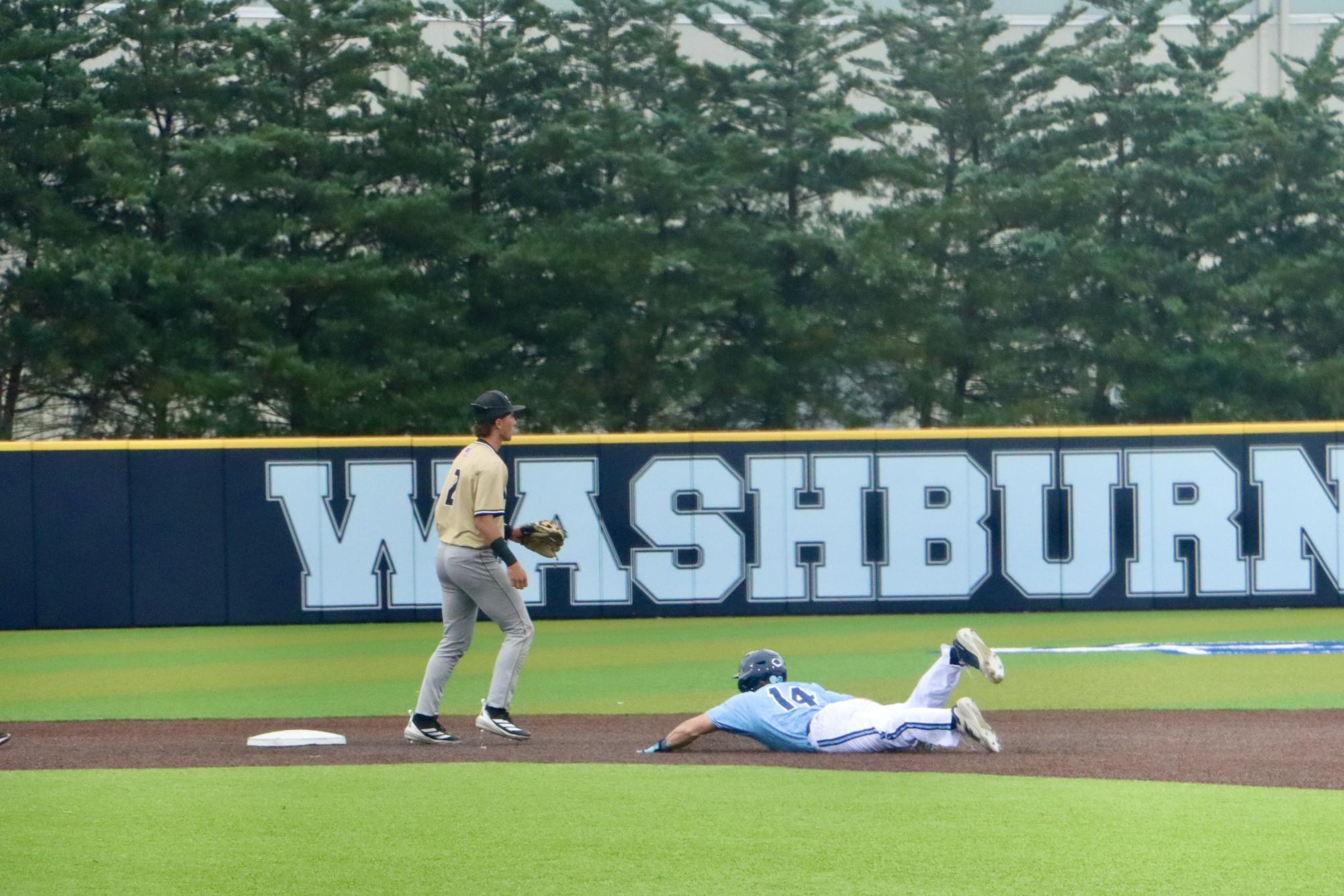 Washburn overcomes long rain delay to beat Emporia State 6-3