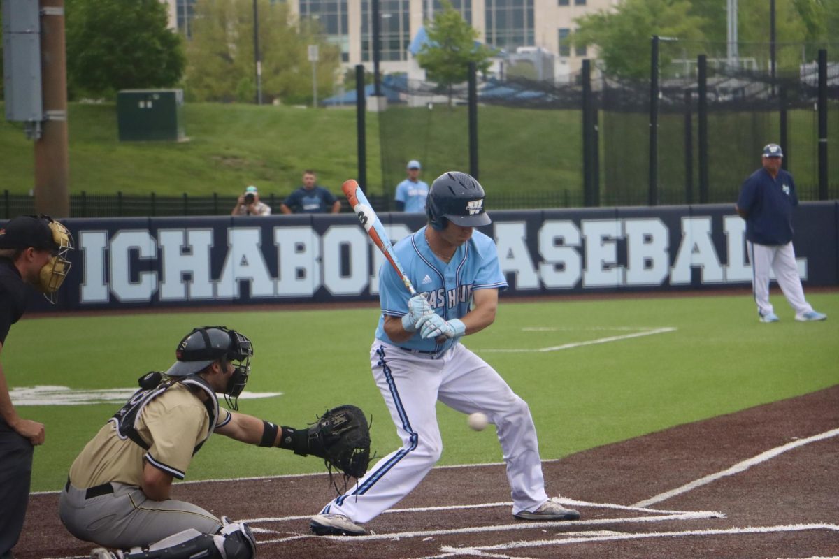Junior utility Trenton Barry swings at bat and hits the ball. Barry had 3 at-bats and 2 hits.