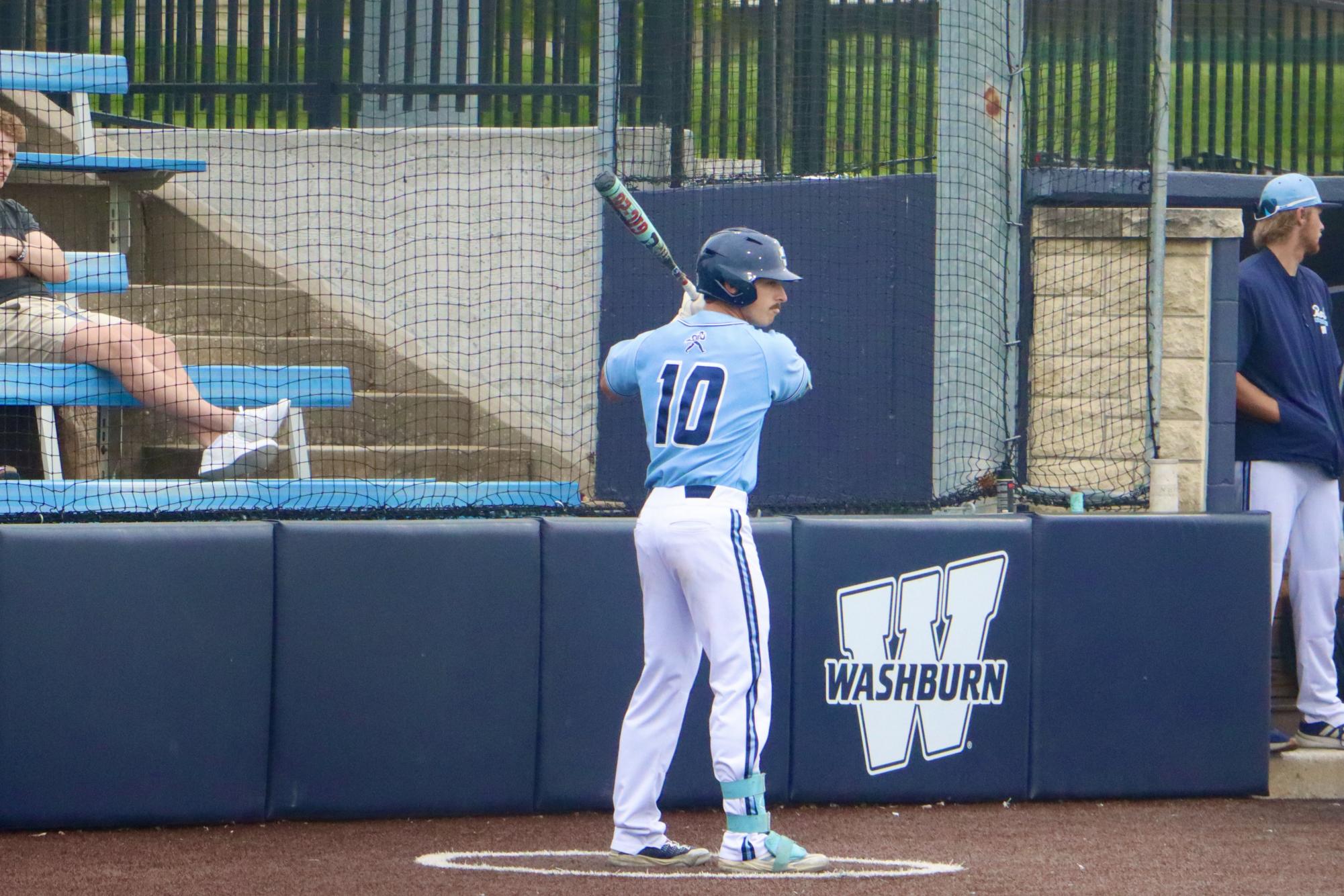 Washburn overcomes long rain delay to beat Emporia State 6-3